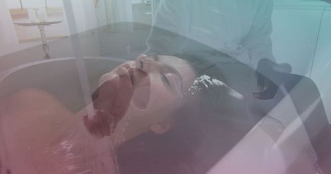 Woman Experiencing Blissful Relaxation in Spa Bath
