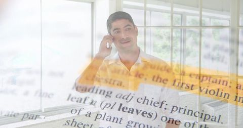 Professional talking on phone with dictionary text overlay and orange highlight