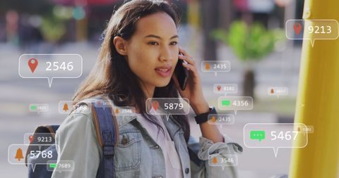 Asian Woman Engaging with Social Media Location Markers in Urban Setting