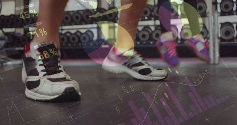 Athletes running on treadmills with digital fitness metrics display