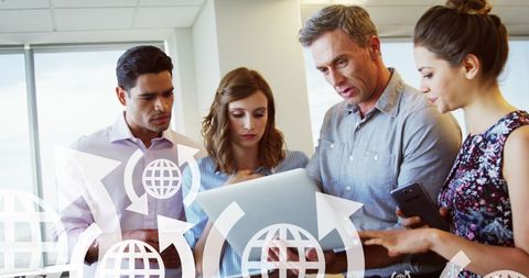 Global Strategy Discussion Among Diverse Team in Modern Office