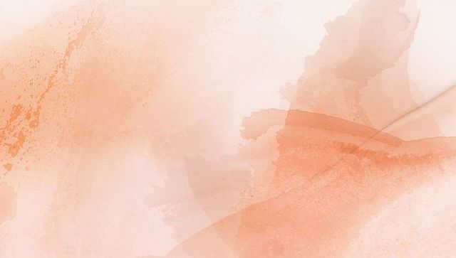 Soft peach watercolor wash translucent layers speckled brush texture pastel background