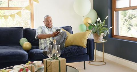 Senior Man Celebrating Birthday Home Interior Relaxation