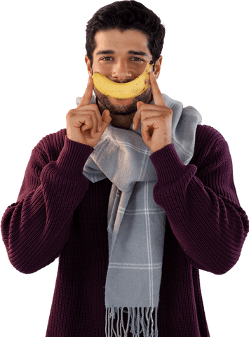 cheerful man holding banana as smiling accessory transparent background - Download Free Stock Videos Pikwizard.com