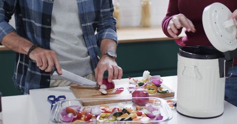 Couple Preparing Vegetables Together in Modern Kitchen