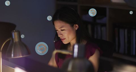 Focused Professional Working Night Shift in Office