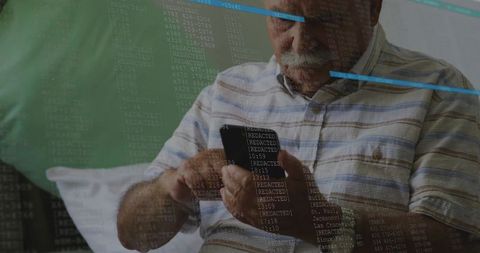Senior man holding and tapping smartphone on bed with redacted data overlay digital privacy concept