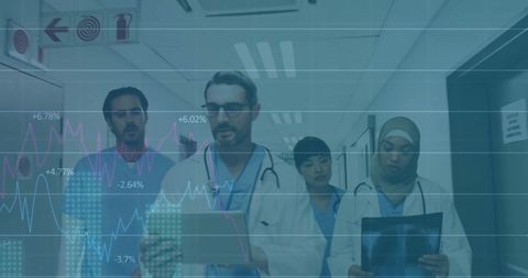 Medical team analyzing digital health data in hospital