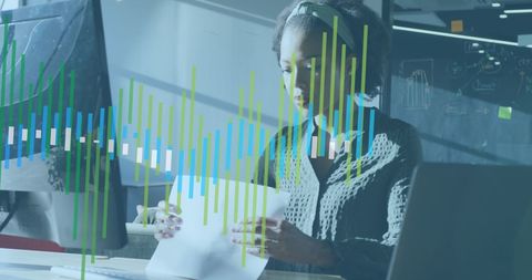 Businesswoman Analyzing Financial Charts in Modern Office - Download Free Stock Images Pikwizard.com