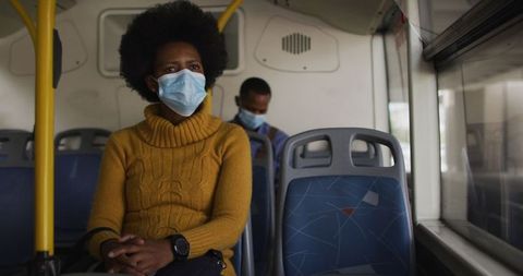 Individuals with Face Masks Riding Bus During Pandemic - Download Free Stock Images Pikwizard.com