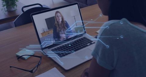 Joining remote tech meeting with woman explaining and digital circuit overlay on laptop