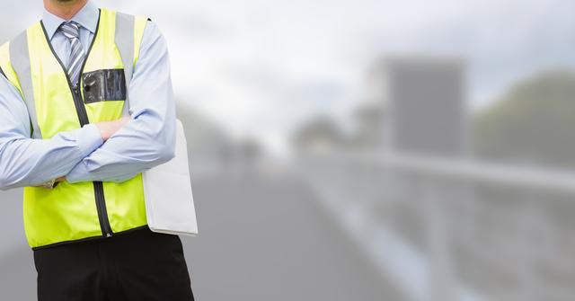 Digital composite of Traffic controller with his hands folded on blurred background of the city