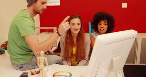 Creative Team Engaged in Design Project Discussion