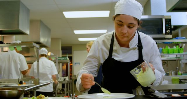 Professional Chef Preparing Elegant Dish in Modern Kitchen - Download Free Stock Images Pikwizard.com