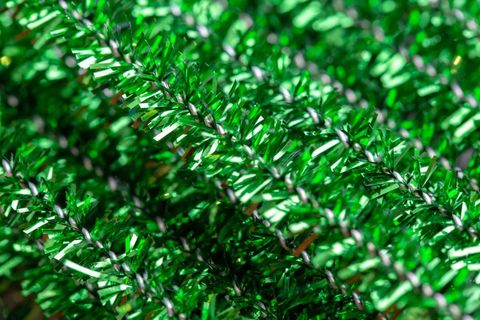 Close-up of shiny green christmas tinsel