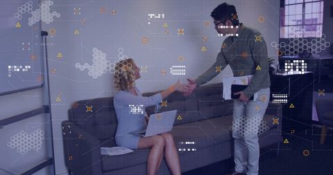 Diverse Business Professionals Collaborating with Digital Interface