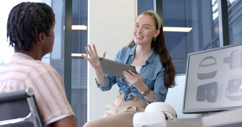 Businesswoman Engaging in Team Collaboration with Colleague