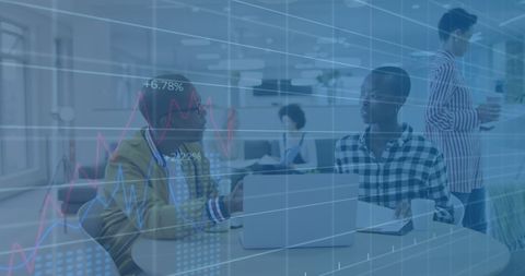 Global financial data overlay with business professionals meeting
