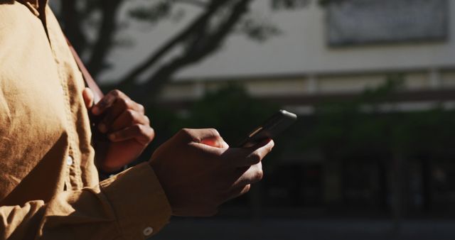 Close-up of Person Texting Outdoors with Smartphone - Download Free Stock Images Pikwizard.com