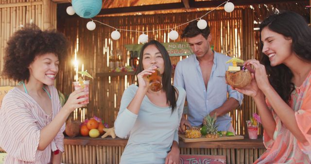 Friends Enjoying Tropical Drinks at Outdoor Beach Bar - Download Free Stock Images Pikwizard.com