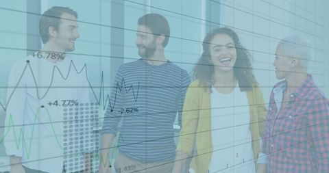 Professionals Discussing Data with Overlapping Digital Graphs