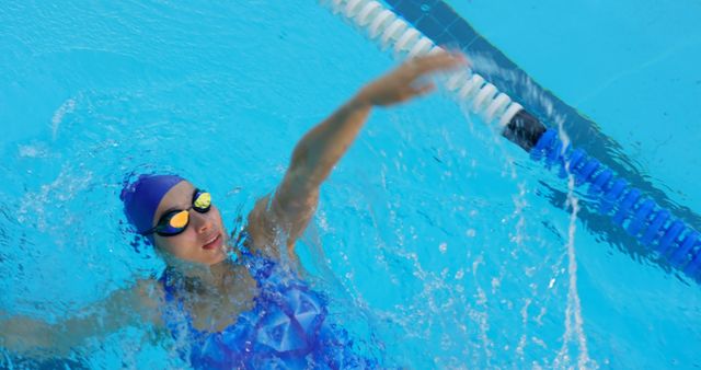 Professional Swimmer Practicing Lane Swimming in Pool - Download Free Stock Images Pikwizard.com