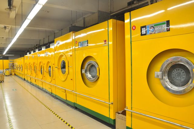 Modern Industrial Laundry Machines in Spacious Facility - Download Free Stock Photos Pikwizard.com