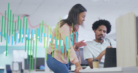 Diverse Coworkers Analyzing Business Reports with Digital Graphs in Office