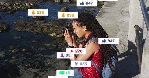 Woman Photographer with Social Media Interactions by Beach