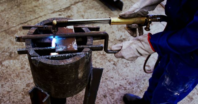 Welder Cutting Metal with Torch in Workshop - Download Free Stock Images Pikwizard.com