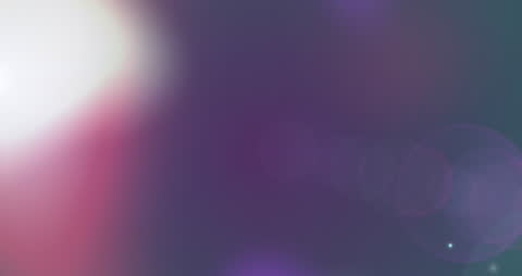 Blurred Light Spots with Cityscape Backdrop in Motion