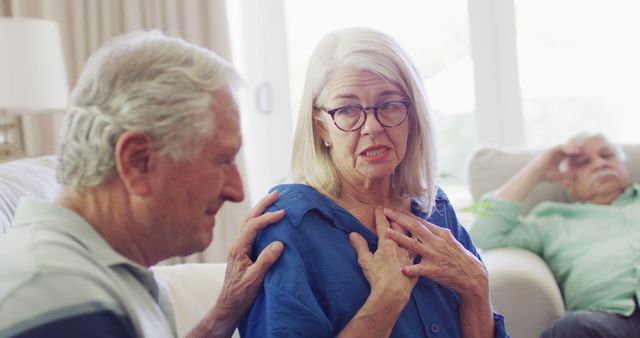 Concerned Seniors in Discussion at Home - Download Free Stock Images Pikwizard.com