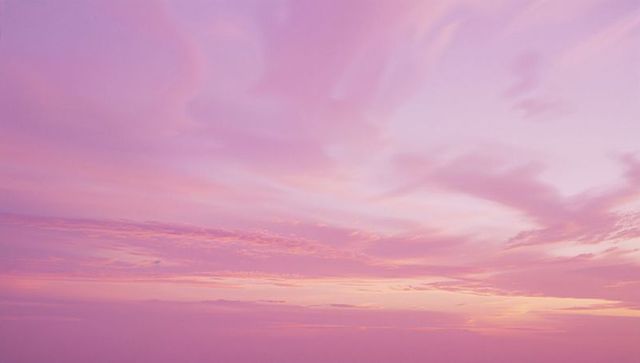 Pink Dusk Sky with Featherlike Clouds and Soft Gradients