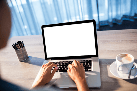 Person Using Laptop with Transparent Blank Screen Near Coffee - Download Free Stock Videos Pikwizard.com