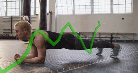 Woman performing plank with fitness progress overlay