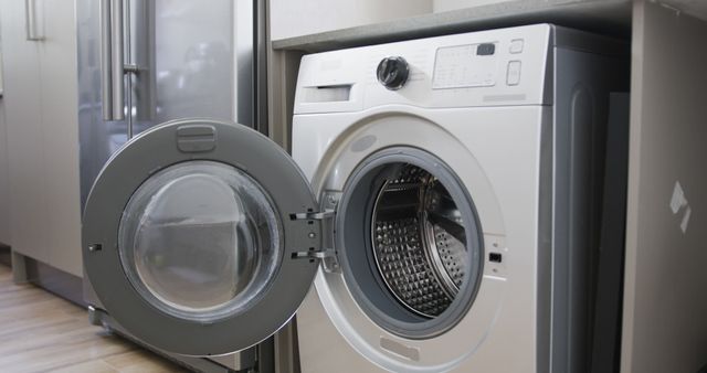 Modern Front-Loading Washing Machine with Open Door in Kitchen - Download Free Stock Images Pikwizard.com