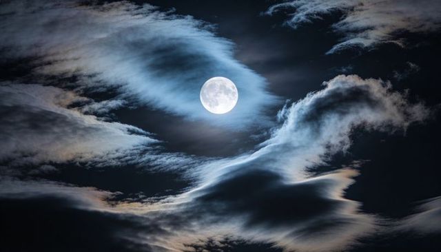 Full Moon Casting Halo and Lighting Layered Wispy Clouds, Iridescent Night Sky