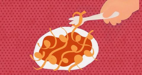 Minimalist pasta dish with fork and red polka dot background