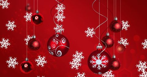 Festive Red Christmas Ornaments and Snowflakes Background