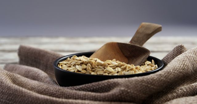 Wooden Scoop and Bowl of Oats on Burlap Fabric - Download Free Stock Images Pikwizard.com