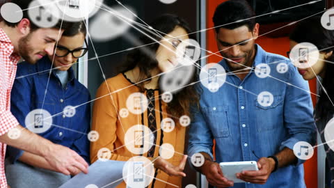 Diverse Team Collaborating on Digital Tablet Technology