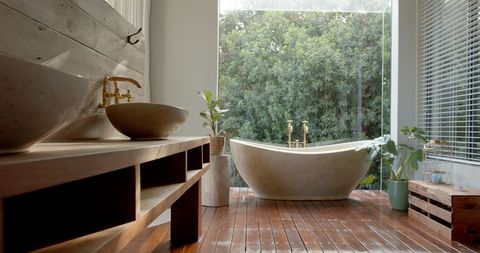 Modern Bathroom with Freestanding Tub and Wood Vanity Design - Download Free Stock Images Pikwizard.com