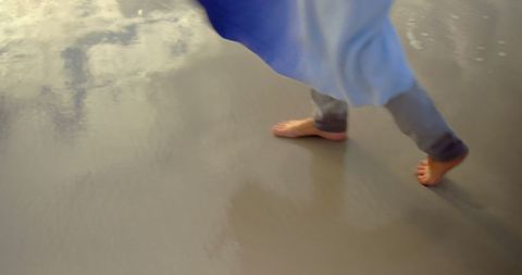 Barefoot Walk on Beach with Gentle Waves