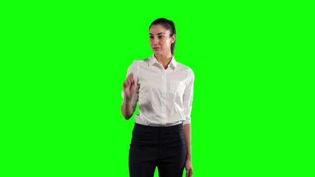 Perfect for use in marketing materials, presentations, and advertisements where the addition of a virtual object or product is required. The green screen background allows easy editing and overlay of custom elements.