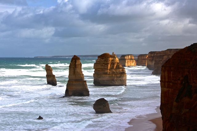 Ideal for travel agencies, nature magazines, and landscape calendars. Highlighting the rugged beauty of Australia's coastal landscape, perfect for attracting tourists or for use in educational materials about natural rock formations and seaside attractions.