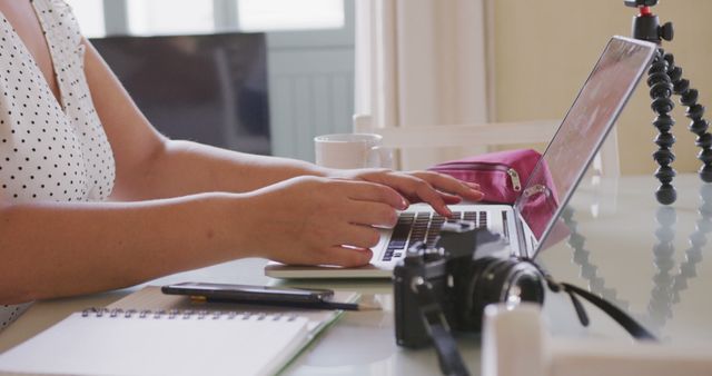 Woman Working on Laptop with Camera Equipment on Desk - Download Free Stock Images Pikwizard.com