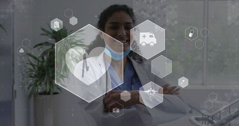 Smiling female doctor wearing lab coat and stethoscope with futuristic medical interface