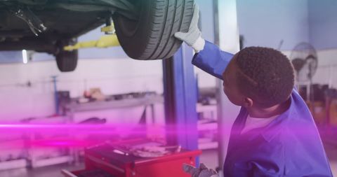Mechanic Working on Vehicle With Light Trails Effect - Download Free Stock Images Pikwizard.com