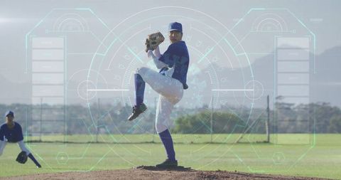 Baseball Pitcher Preparing Throw at Outdoor Sports Field