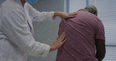 Medical professional performing diagnostic examination in clinic